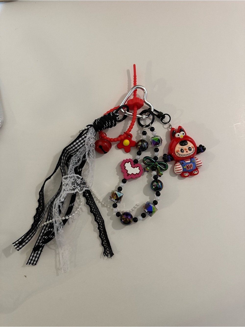 Cute Red Character Keychain with Black & White Ribbon Tassels